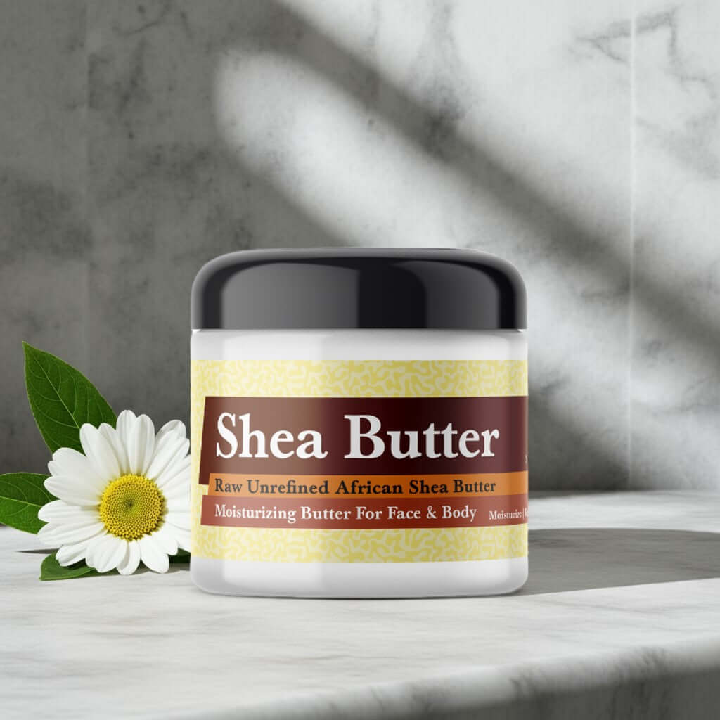 Jar of Burberry Brit Inspired Scented Shea Butter with a flower beside it on a marble surface.