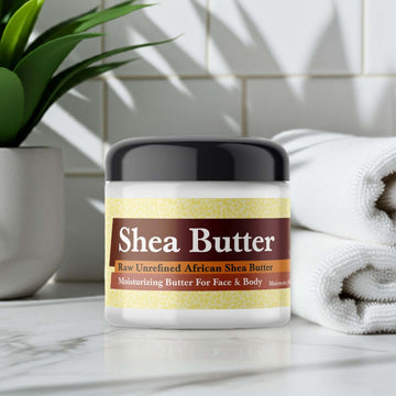 Clean Cotton Scented Shea Butter in a jar with natural ingredients in background, perfect for moisturizing and skincare.