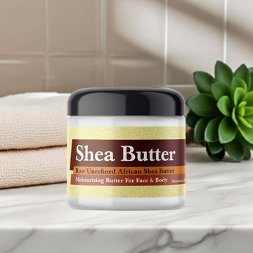 Cocoa Butter Cashmere Scented Shea Butter jar on a bathroom counter