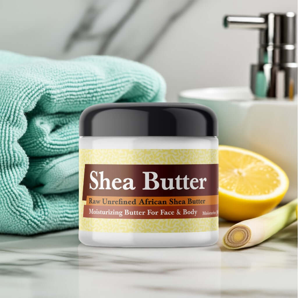 Jar of Lemongrass Scented Shea Butter on bathroom counter with lemongrass and lemon