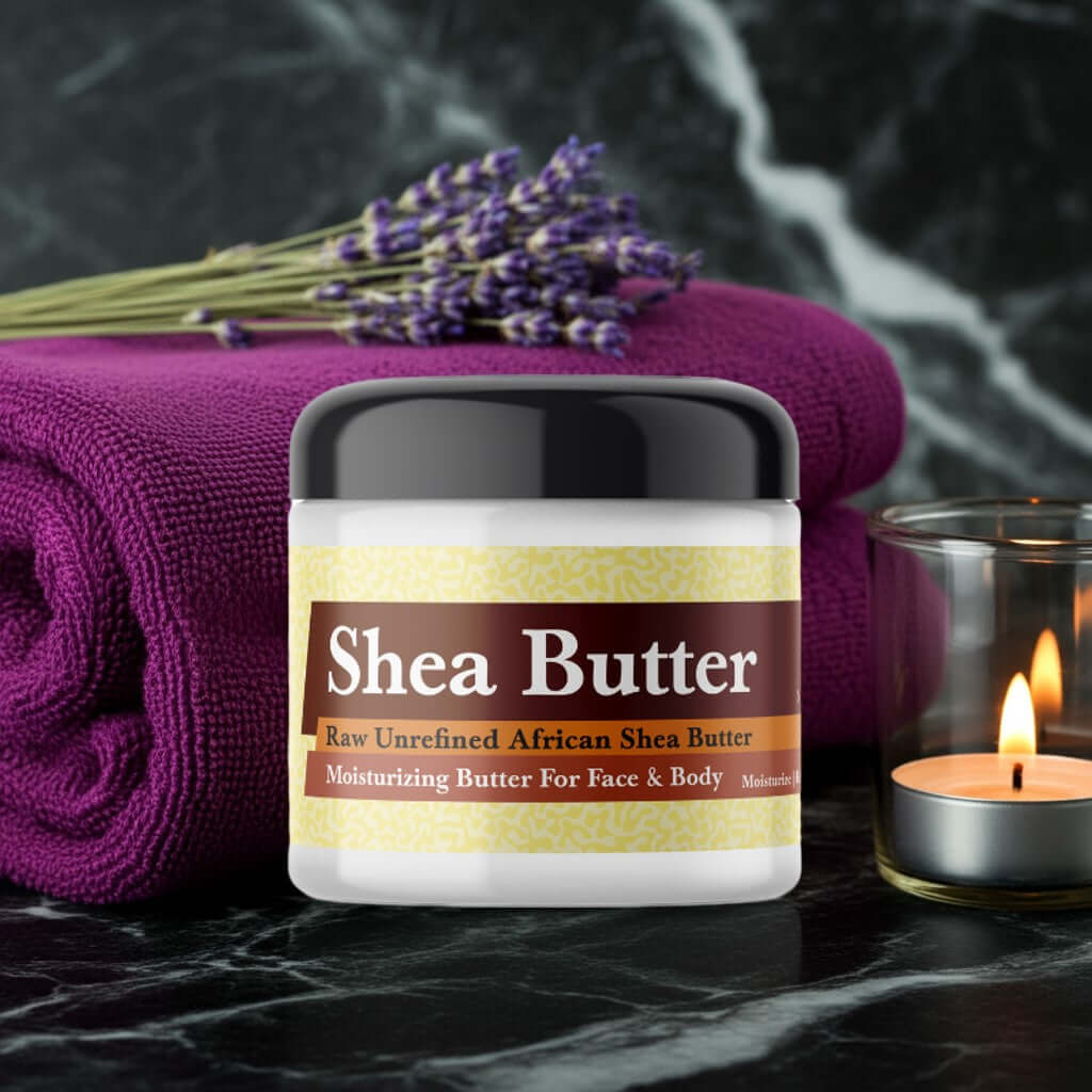 Purple Haze Scented Shea Butter jar with lavender, purple towel, and candle on marble surface.