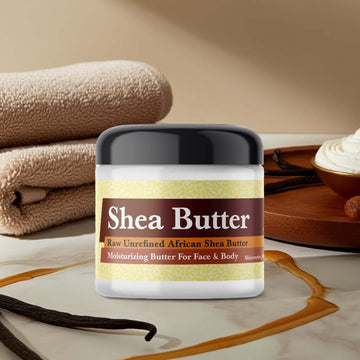 Vanilla Scented Shea Butter on spa background with vanilla beans and towels