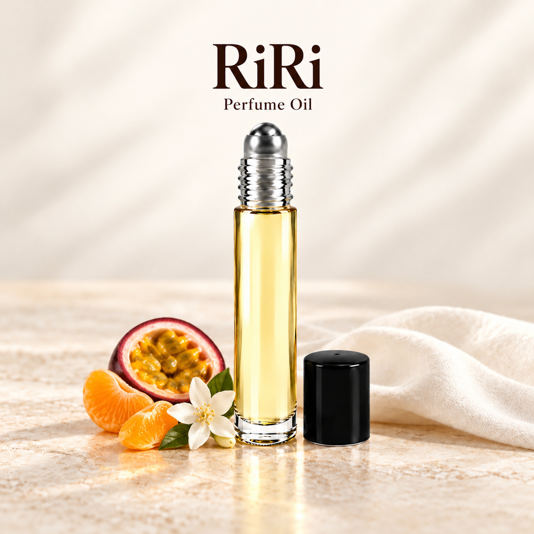 Rihanna RiRi Perfume Oil with simple scent note accents on soft ivory