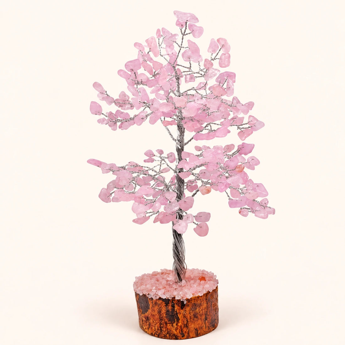 Rose Quartz Crystal Tree on a soft ivory background; view 1.