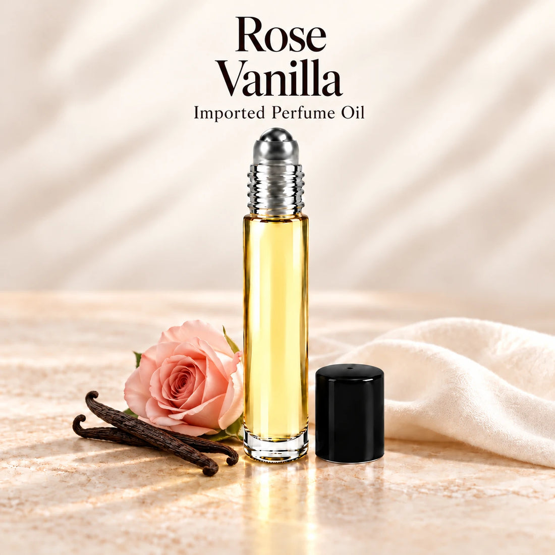 Rose Vanilla imported perfume oil with a blush rose and vanilla pods on soft ivory