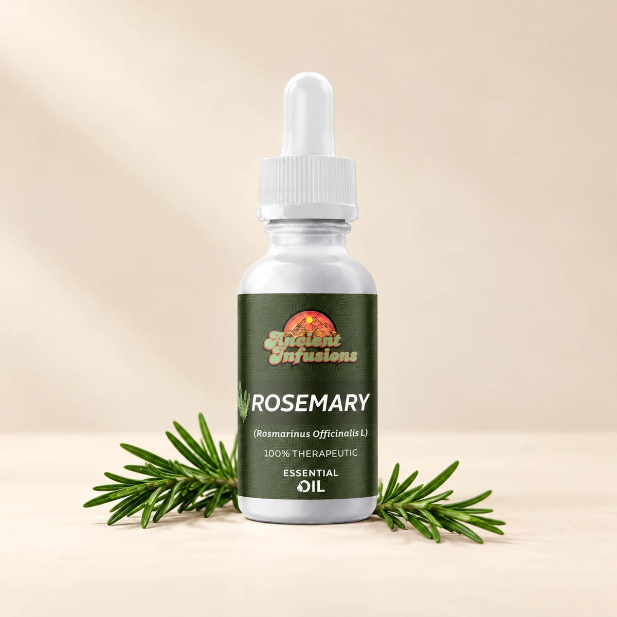 Ancient Infusions Rosemary Essential Oil bottle with botanicals on a soft ivory background.