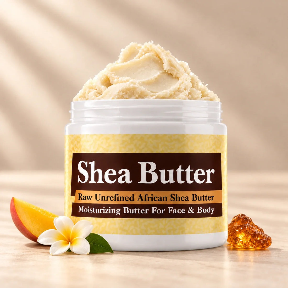 African Fantasy Shea Butter in an open white jar with textured ivory shea butter and subtle scent accents on a soft cream background.