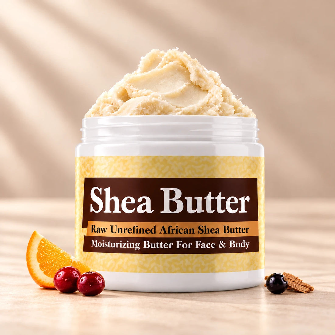 Sean John I Am King Shea Butter in an open white jar with ivory shea butter, subtle orange, cranberry and cedar accents on a soft cream background.