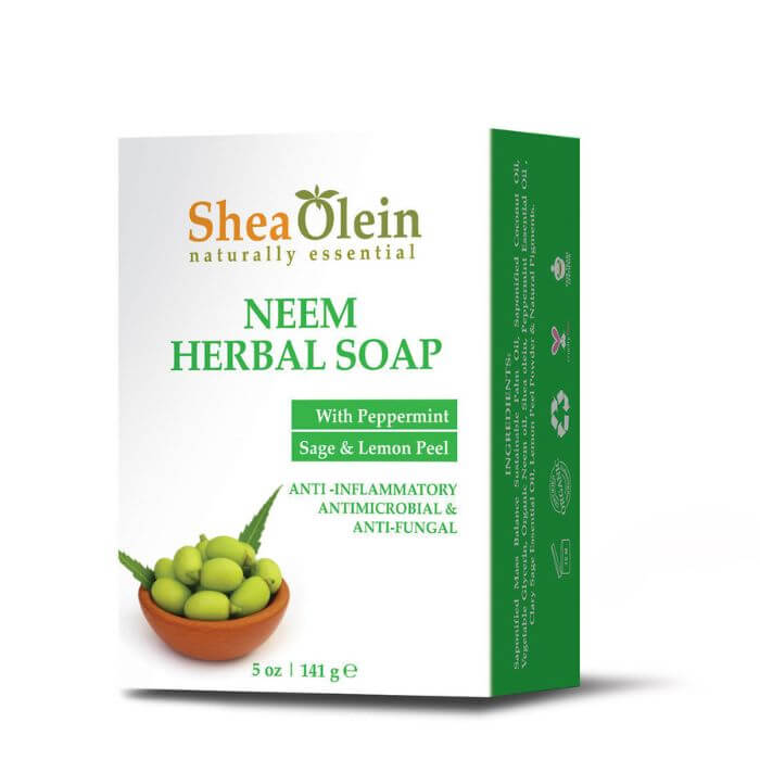Shea Olein Neem Herbal Soap Bar with peppermint, sage, and lemon peel for detox, calm, and skin protection, displayed with greenery.