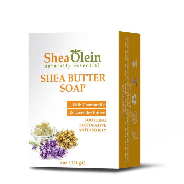 Shea Olein Shea Butter Soap with box, chamomile, lavender, and shea butter on beige counter – soothing and restorative body bar for dry, sensitive skin.