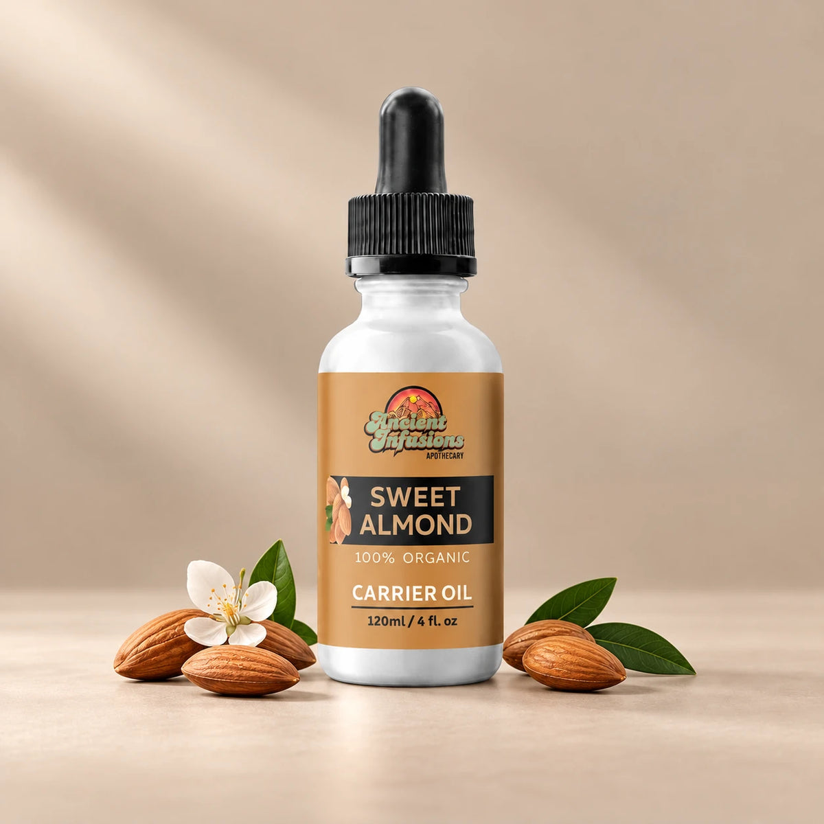 Ancient Infusions Sweet Almond Carrier Oil silver bottle with black dropper on a warm stone background.