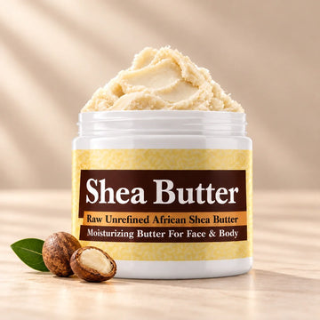 Unscented Raw African Shea Butter in an open white jar with textured ivory shea butter and subtle scent accents on a soft cream background.