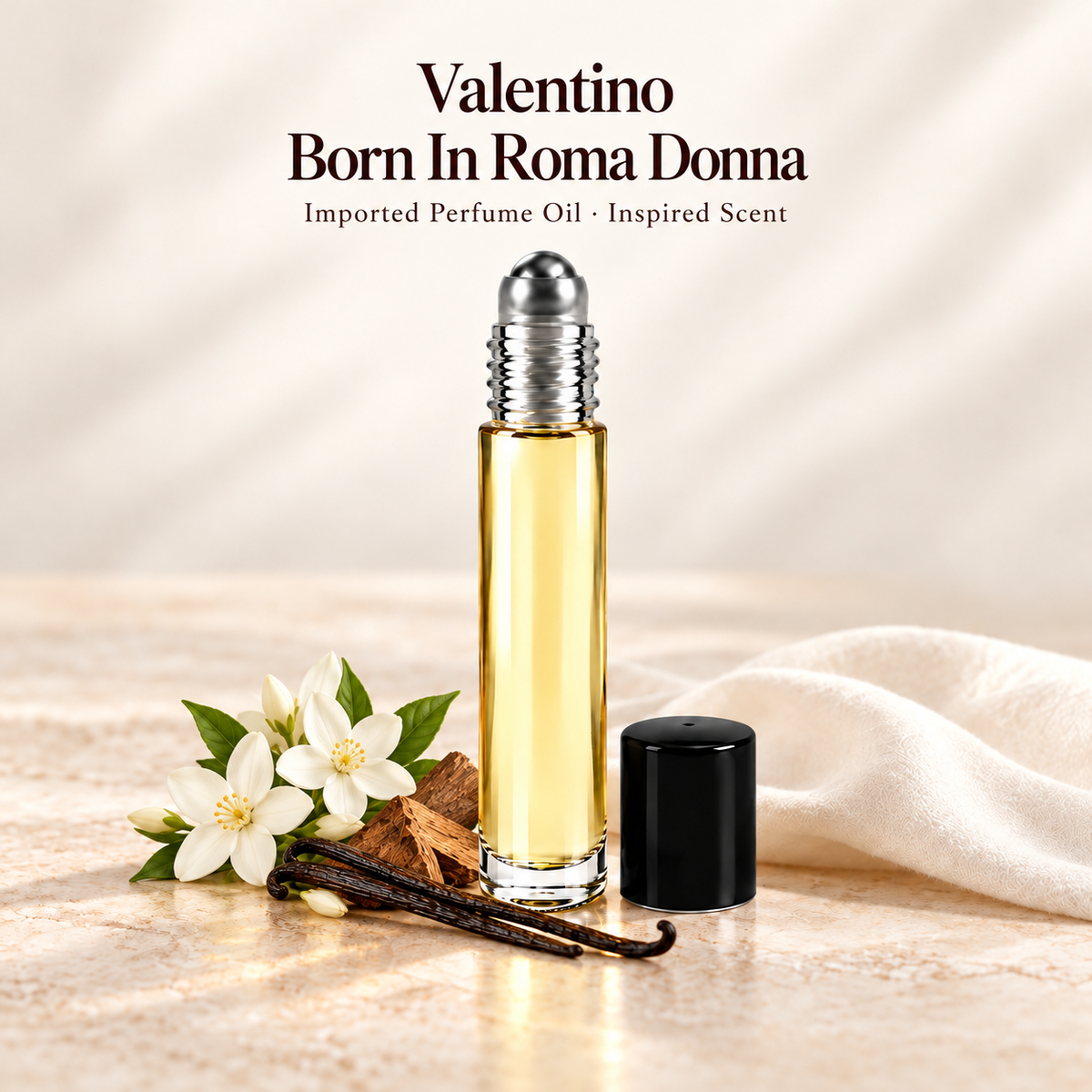 Valentino Born In Roma Donna Perfume Oil with minimal scent note accents on soft ivory