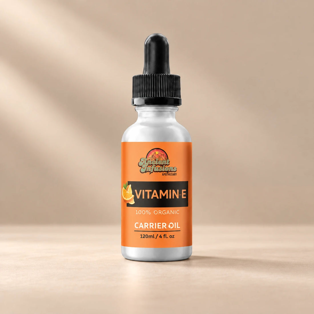 Ancient Infusions Vitamin E Carrier Oil silver bottle with black dropper on a warm stone background.