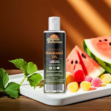 Watermelon Fragrance Oil bottle with juicy watermelon slices and candy, conveying a playful, sweet aroma for summer