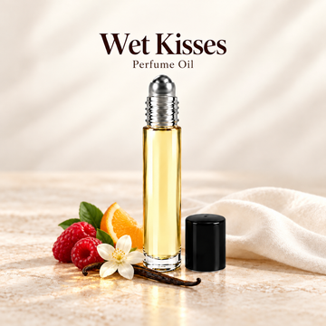 Wet Kisses Perfume Oil with simple scent note accents on soft ivory