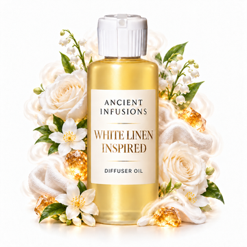 White Linen Inspired Diffuser Oil by Ancient Infusions in a golden oil bottle with scent artwork