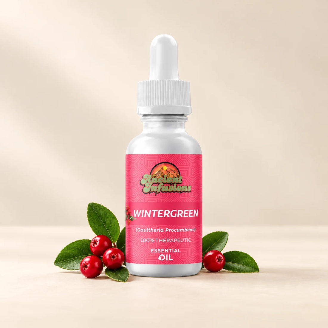Ancient Infusions Wintergreen Essential Oil bottle with botanicals on a soft ivory background.