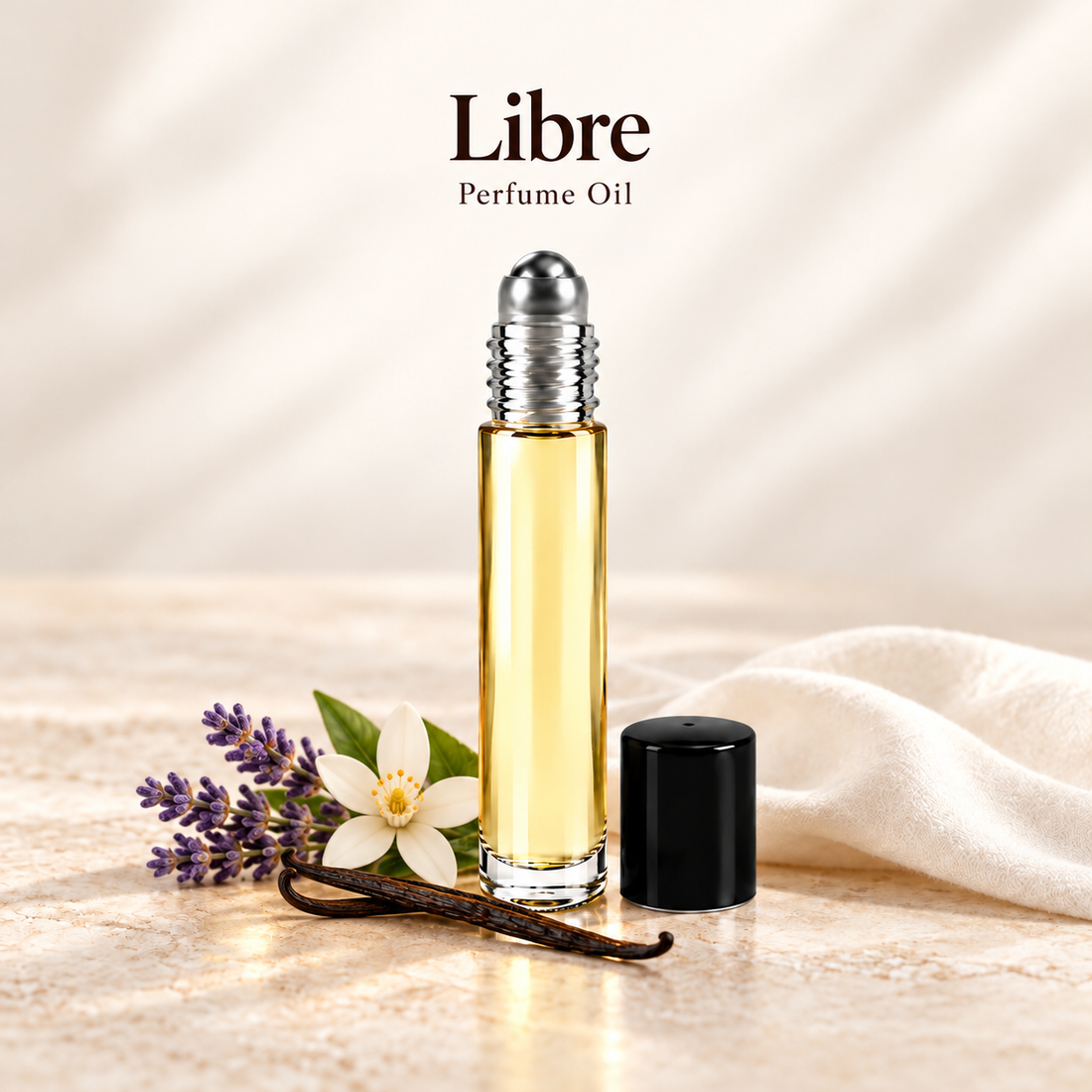 YSL Libre Perfume Oil with simple scent note accents on soft ivory
