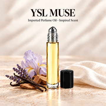YSL Muse inspired imported perfume oil in an Ancient Infusions glass roll-on bottle on ivory stone, with iris, lavender, vanilla pods and wood scent cues.